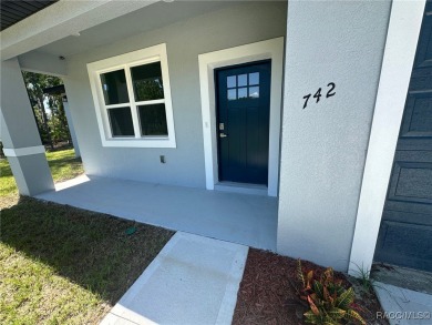 Discover this stunning, brand-new home in Citrus Springs on Citrus Springs Country Club in Florida - for sale on GolfHomes.com, golf home, golf lot