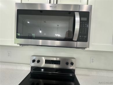 Discover this stunning, brand-new home in Citrus Springs on Citrus Springs Country Club in Florida - for sale on GolfHomes.com, golf home, golf lot