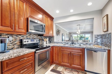 Experience the ultimate Delray Beach lifestyle in this remodeled on Delaire Golf and Country Club in Florida - for sale on GolfHomes.com, golf home, golf lot