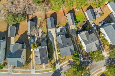 Welcome to this stunning home, nestled on a private wooded lot on Charleston National Golf Club in South Carolina - for sale on GolfHomes.com, golf home, golf lot