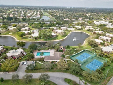 Experience the ultimate Delray Beach lifestyle in this remodeled on Delaire Golf and Country Club in Florida - for sale on GolfHomes.com, golf home, golf lot