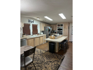 Manufactured Home on Leased Land with Lot Rent. This inviting on Whisperwood Golf Course in Florida - for sale on GolfHomes.com, golf home, golf lot