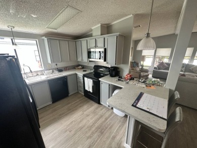 This well loved 2 bedroom, 2 bathroom Palm Harbor home is being on Del Tura Golf and Country Club in Florida - for sale on GolfHomes.com, golf home, golf lot