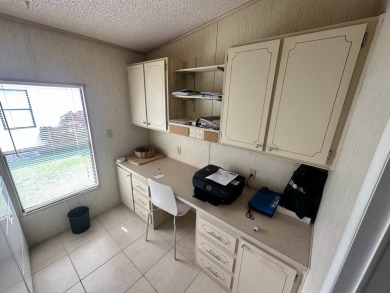 This well loved 2 bedroom, 2 bathroom Palm Harbor home is being on Del Tura Golf and Country Club in Florida - for sale on GolfHomes.com, golf home, golf lot