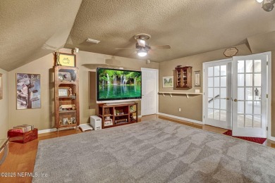 Stunning 4-Bedroom Home with Bonus Room in Gated Golf Course on Cimarrone Golf and Country Club in Florida - for sale on GolfHomes.com, golf home, golf lot