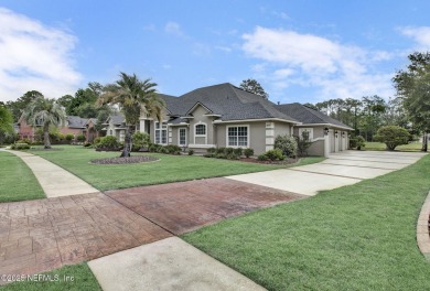 Stunning 4-Bedroom Home with Bonus Room in Gated Golf Course on Cimarrone Golf and Country Club in Florida - for sale on GolfHomes.com, golf home, golf lot