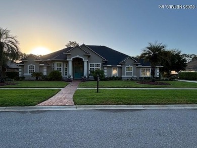 Stunning 4-Bedroom Home with Bonus Room in Gated Golf Course on Cimarrone Golf and Country Club in Florida - for sale on GolfHomes.com, golf home, golf lot