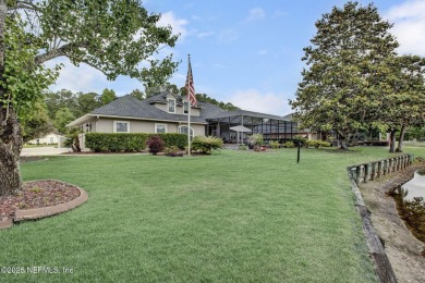 Stunning 4-Bedroom Home with Bonus Room in Gated Golf Course on Cimarrone Golf and Country Club in Florida - for sale on GolfHomes.com, golf home, golf lot