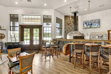 Stunning 4-Bedroom Home with Bonus Room in Gated Golf Course on Cimarrone Golf and Country Club in Florida - for sale on GolfHomes.com, golf home, golf lot