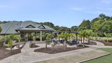 Stunning 4-Bedroom Home with Bonus Room in Gated Golf Course on Cimarrone Golf and Country Club in Florida - for sale on GolfHomes.com, golf home, golf lot
