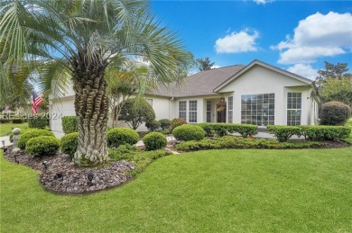 Located in Sun City Hilton Head, this charming Hatteras model on Hidden Cypress Golf Club in South Carolina - for sale on GolfHomes.com, golf home, golf lot