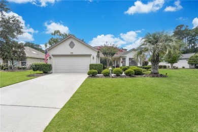 Located in Sun City Hilton Head, this charming Hatteras model on Hidden Cypress Golf Club in South Carolina - for sale on GolfHomes.com, golf home, golf lot