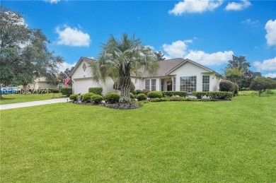 Located in Sun City Hilton Head, this charming Hatteras model on Hidden Cypress Golf Club in South Carolina - for sale on GolfHomes.com, golf home, golf lot