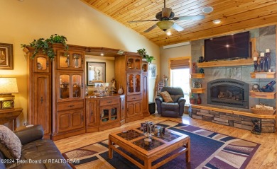 Experience unparalleled luxury living in this custom 4300 sq ft on Cedar Creek Golf Course in Wyoming - for sale on GolfHomes.com, golf home, golf lot