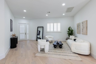 This beautifully renovated residence features new Italian wood on Palm Beach Polo and Country Club in Florida - for sale on GolfHomes.com, golf home, golf lot