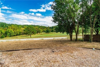Wake up to golf course views from your covered deck--this on Bella Vista Country Club - Scottsdale in Arkansas - for sale on GolfHomes.com, golf home, golf lot