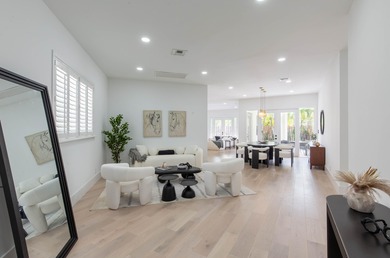 This beautifully renovated residence features new Italian wood on Palm Beach Polo and Country Club in Florida - for sale on GolfHomes.com, golf home, golf lot