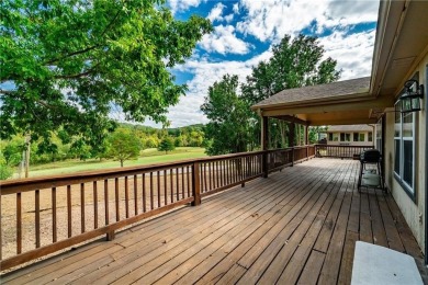 Wake up to golf course views from your covered deck--this on Bella Vista Country Club - Scottsdale in Arkansas - for sale on GolfHomes.com, golf home, golf lot