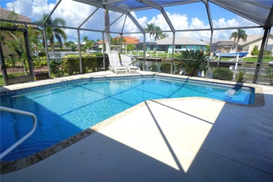 Welcome to Punta Gorda and this amazing home in the golf course on Twin Isles Country Club in Florida - for sale on GolfHomes.com, golf home, golf lot