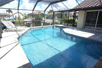 Welcome to Punta Gorda and this amazing home in the golf course on Twin Isles Country Club in Florida - for sale on GolfHomes.com, golf home, golf lot