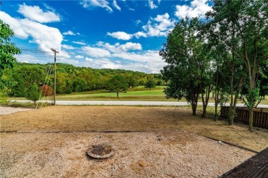 Wake up to golf course views from your covered deck--this on Bella Vista Country Club - Scottsdale in Arkansas - for sale on GolfHomes.com, golf home, golf lot