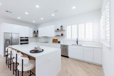 This beautifully renovated residence features new Italian wood on Palm Beach Polo and Country Club in Florida - for sale on GolfHomes.com, golf home, golf lot