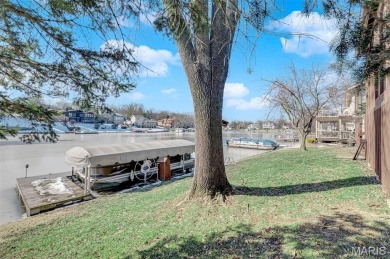Get ready to Jump into Lake Life! This updated lakefront home on on Lake Saint Louis Par 3 in Missouri - for sale on GolfHomes.com, golf home, golf lot