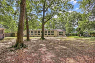 Welcome to your dream home at 103 Wofford Lane in the charming on The Hackler Course at Coastal Carolina University in South Carolina - for sale on GolfHomes.com, golf home, golf lot