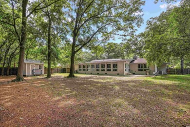 Welcome to your dream home at 103 Wofford Lane in the charming on The Hackler Course at Coastal Carolina University in South Carolina - for sale on GolfHomes.com, golf home, golf lot