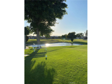 Looking for a home to sit on the back patio, look at beautiful on Panorama Village Golf Course in California - for sale on GolfHomes.com, golf home, golf lot