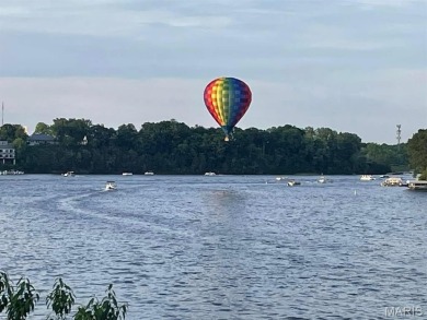 Get ready to Jump into Lake Life! This updated lakefront home on on Lake Saint Louis Par 3 in Missouri - for sale on GolfHomes.com, golf home, golf lot