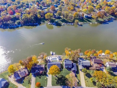 Get ready to Jump into Lake Life! This updated lakefront home on on Lake Saint Louis Par 3 in Missouri - for sale on GolfHomes.com, golf home, golf lot