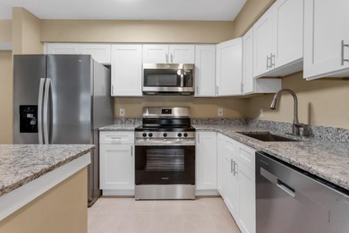 One or more photo(s) has been virtually staged. AS GOOD AS NEW! on Hunters Green Country Club in Florida - for sale on GolfHomes.com, golf home, golf lot