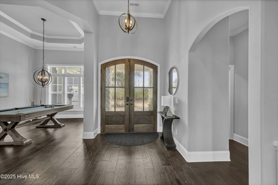 This exceptional home blends refined finishes, thoughtful design on Cape Fear National At Brunswick Forest in North Carolina - for sale on GolfHomes.com, golf home, golf lot