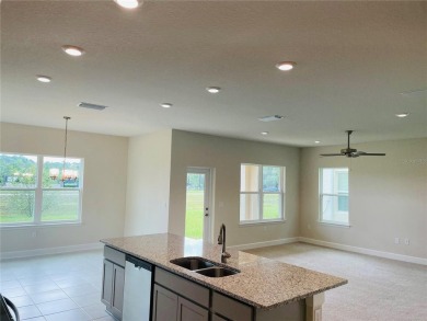 Discover your dream home featuring 4 bedrooms, 2.5 bathrooms on Harmony Golf Preserve in Florida - for sale on GolfHomes.com, golf home, golf lot