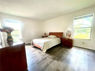 JUST REDUCED!!!This charming corner unit is nestled in Rokest on Colony West Country Club in Florida - for sale on GolfHomes.com, golf home, golf lot
