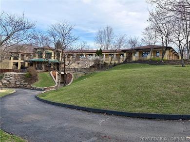 Grand views await on Grand View Drive in the prestigious Porta on The Club At Porto Cima in Missouri - for sale on GolfHomes.com, golf home, golf lot