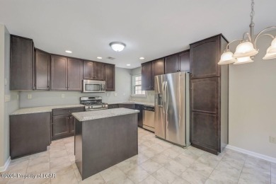 Stunning & spacious ranch condo in the desirable Sand Springs on Sand Springs Country Club in Pennsylvania - for sale on GolfHomes.com, golf home, golf lot