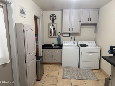 This beautifully updated home sits on an oversized lot in on Sunland Village East Golf Course in Arizona - for sale on GolfHomes.com, golf home, golf lot