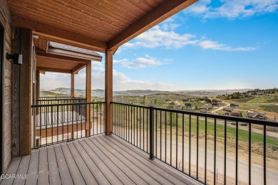 MODEL OPEN DAILY, enjoy these gorgeous one-of-a-kind townhomes on Headwaters Golf Course At Granby Ranch in Colorado - for sale on GolfHomes.com, golf home, golf lot