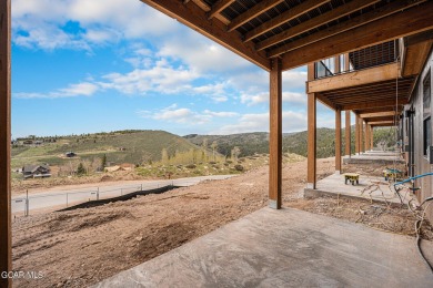 MODEL OPEN DAILY, enjoy these gorgeous one-of-a-kind townhomes on Headwaters Golf Course At Granby Ranch in Colorado - for sale on GolfHomes.com, golf home, golf lot