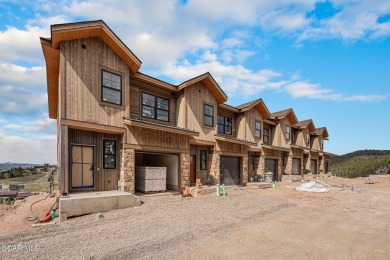 MODEL OPEN DAILY, enjoy these gorgeous one-of-a-kind townhomes on Headwaters Golf Course At Granby Ranch in Colorado - for sale on GolfHomes.com, golf home, golf lot