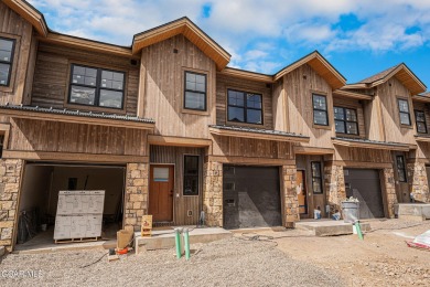 MODEL OPEN DAILY, enjoy these gorgeous one-of-a-kind townhomes on Headwaters Golf Course At Granby Ranch in Colorado - for sale on GolfHomes.com, golf home, golf lot