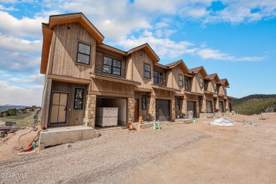 MODEL OPEN DAILY, enjoy these gorgeous one-of-a-kind townhomes on Headwaters Golf Course At Granby Ranch in Colorado - for sale on GolfHomes.com, golf home, golf lot