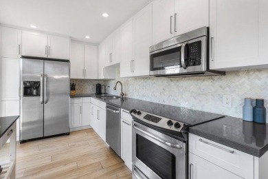 Welcome to this beautifully updated second-floor residence on Quail Ridge Golf Course and Country Club in Florida - for sale on GolfHomes.com, golf home, golf lot
