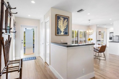 Welcome to this beautifully updated second-floor residence on Quail Ridge Golf Course and Country Club in Florida - for sale on GolfHomes.com, golf home, golf lot