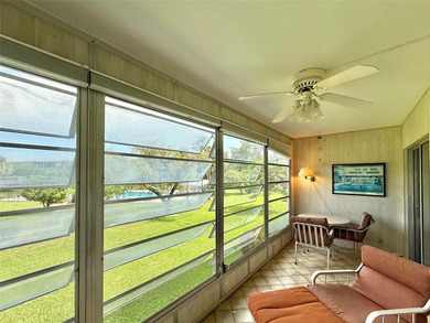 ACTIVE 55+ community! Bright 2nd floor home w/pool view. Receive on Wynmoor Golf Course in Florida - for sale on GolfHomes.com, golf home, golf lot