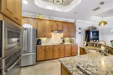 GOLF MEMBERSHIP INCLUDED! Escape to a serene, sun-kissed home on Bonita National Golf Course in Florida - for sale on GolfHomes.com, golf home, golf lot