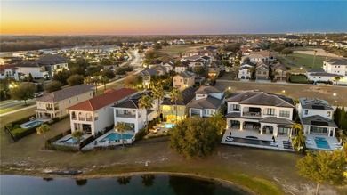 Nestled in the exclusive Reunion Golf Resort, this stunning and on ChampionsGate Golf Resort in Florida - for sale on GolfHomes.com, golf home, golf lot