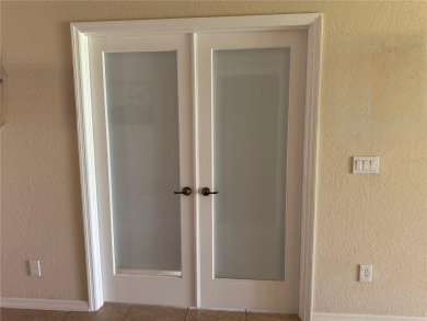 THIS HOME IS A GREAT BUY & READY FOR YOU IN THE GATED PREMIER on Caloosa Greens Executive Golf Course in Florida - for sale on GolfHomes.com, golf home, golf lot